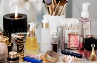 A collection of essential beauty tools for daily self-care, including a facial roller, hairbrush, and skincare applicators on a clean, minimalist background.