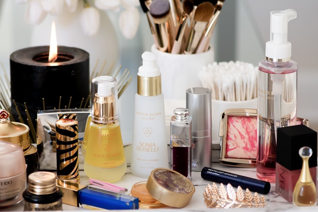 A collection of essential beauty tools for daily self-care, including a facial roller, hairbrush, and skincare applicators on a clean, minimalist background.