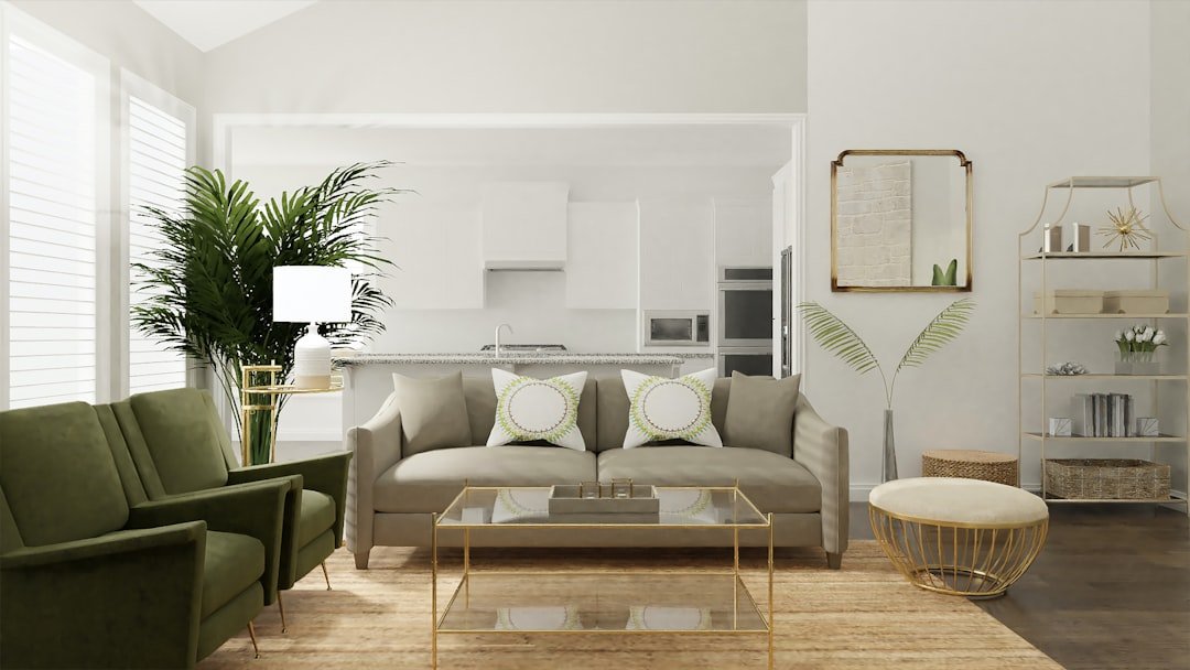 A beautifully arranged living room featuring modern furniture, decorative plants, and cozy textiles, creating an inviting atmosphere.