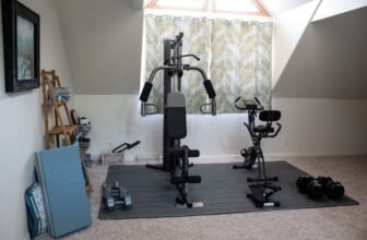 A person using simple fitness gear at home to relieve lower back pain, demonstrating exercises or stretches.