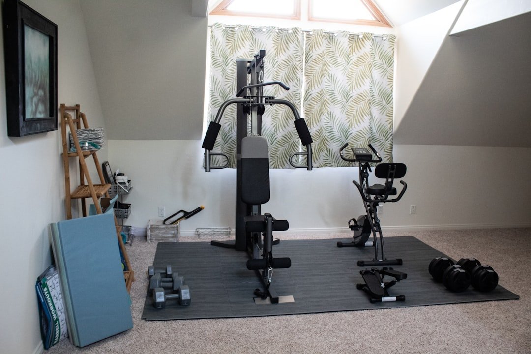 A person using simple fitness gear at home to relieve lower back pain, demonstrating exercises or stretches.