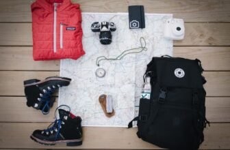A neatly organized suitcase with travel essentials like clothing, toiletries, and gadgets, showcasing an efficient packing strategy.
