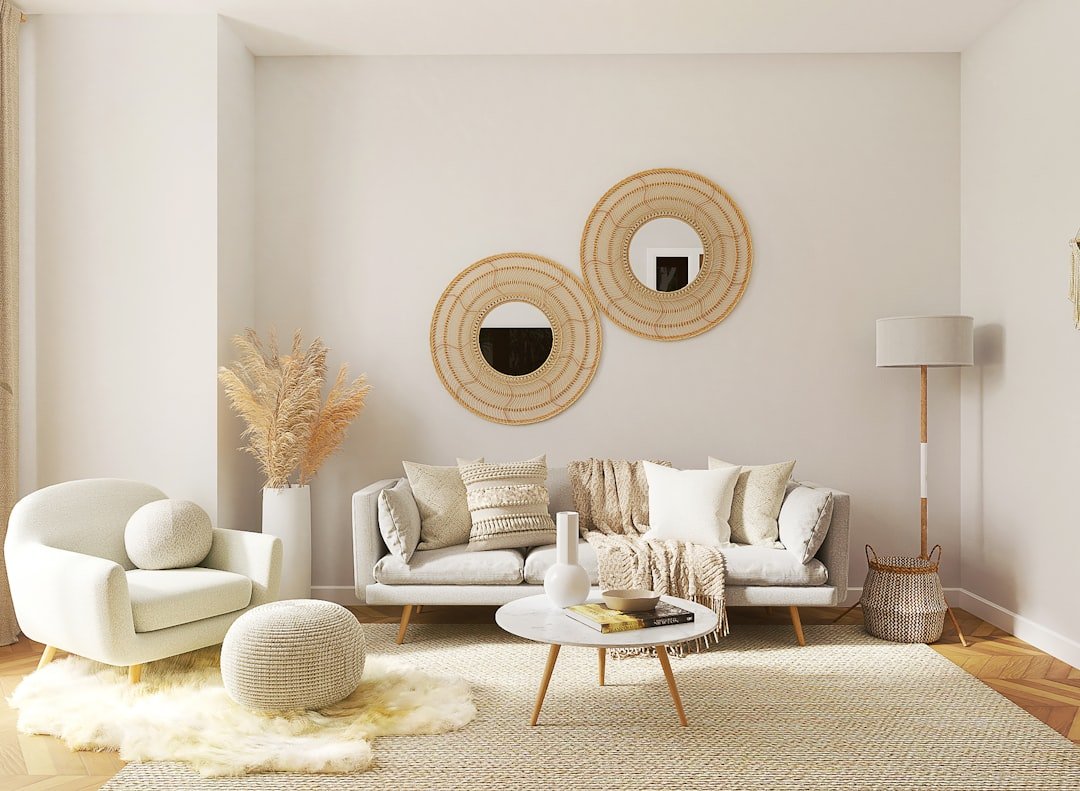 A cozy living room with stylish decor elements like cushions, plants, and artwork.