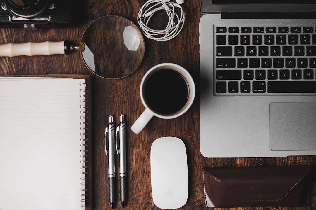 A clean and organized desk setup featuring essential phone and desk accessories that enhance productivity.