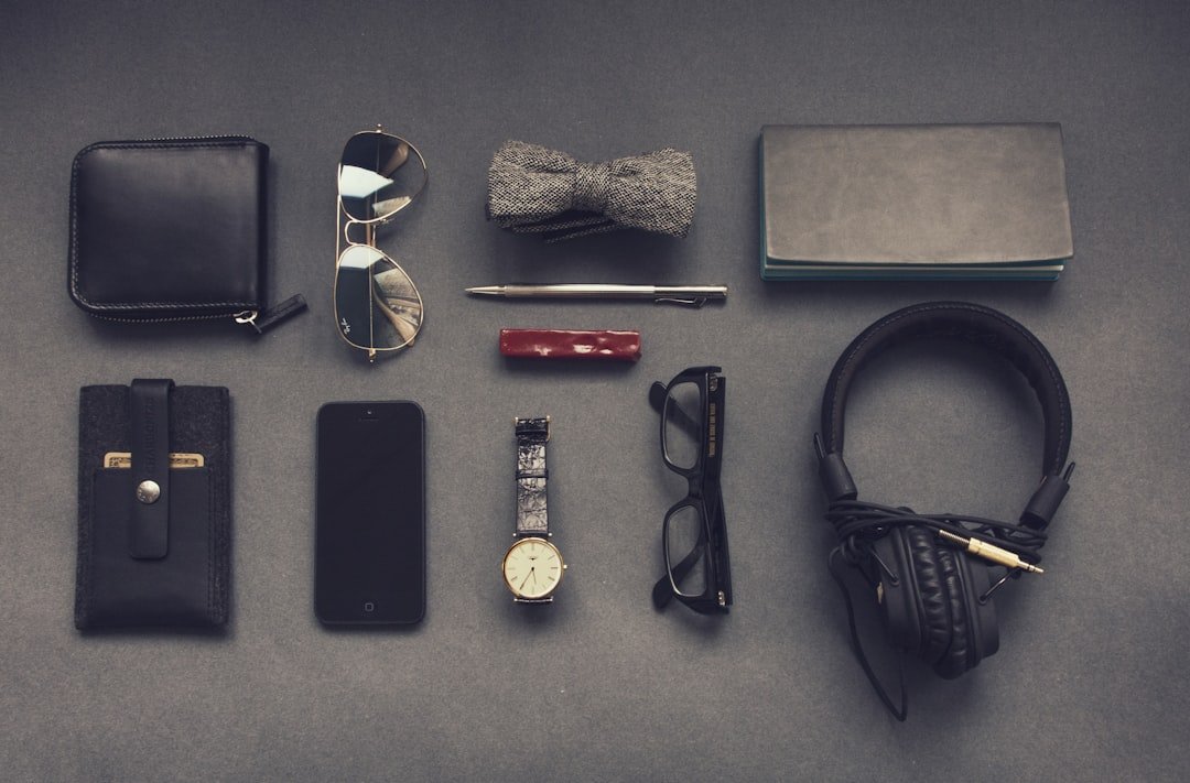 A collection of modern tech accessories for work and travel, including chargers, organizers, and gadgets on a desk.