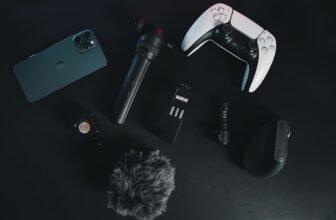 A collection of modern tech gadgets on a clean countertop, showcasing devices that enhance daily convenience and organization.